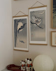 Owl in ginkgo – Ohara Koson art print 30 x 60 cm on a wooden poster hanger in an interior