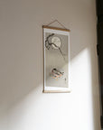 Ducks at full moon – Ohara Koson art print 30 x 60 cm on a wooden poster hanger in an interior