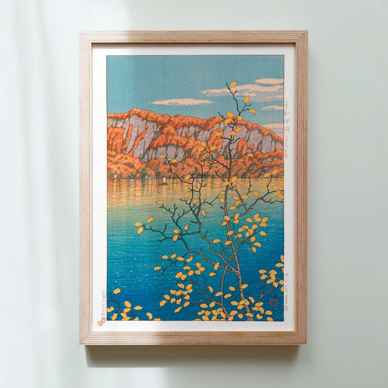 Framed Japanese Art Poster by Kawase Hasui featuring a mountain, lake, and Autumn Leaves