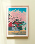 Framed Japanese Art Poster: Cherry tree in bloom with a red building, Kiyomizu Kannon-dō Temple, by Kawase Hasui.
