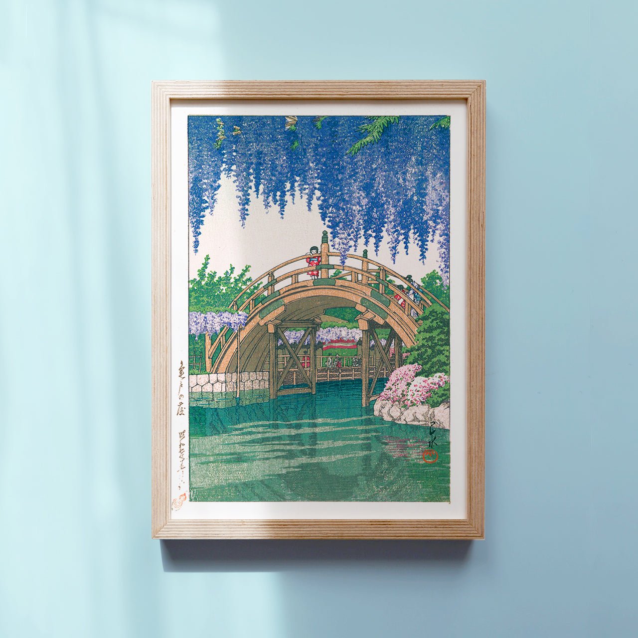 Framed Kawase Hasui's Japanese Art Poster: Wisteria in full bloom in a serene Japanese garden
