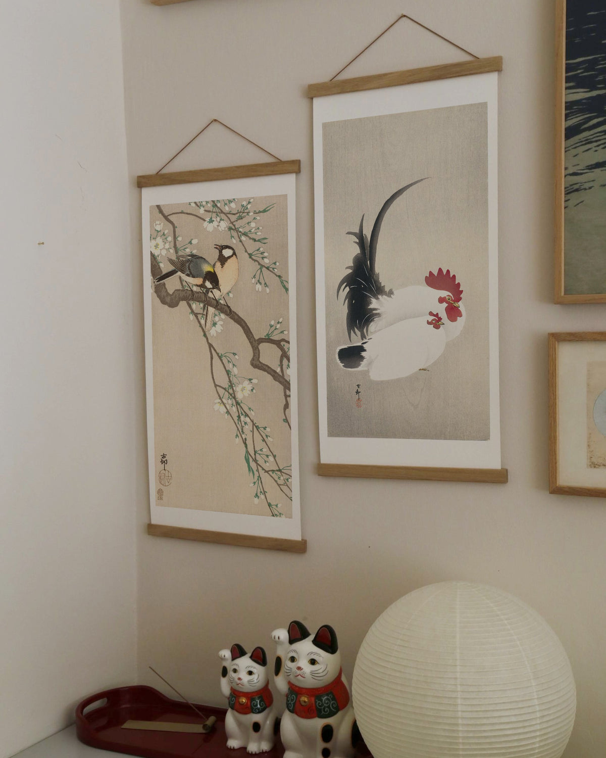 Rooster and Hen – Ohara Koson art print 30 x 60 cm on a wooden poster hanger in an interior