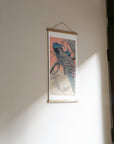 Two Peacocks on Tree Branch – Ohara Koson art print 30 x 60 cm on a wooden poster hanger in an interior