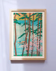 Kawase Hasui's framed Japanese art poster depicting exhibits a boat sailing on water, surrounded by cherry trees in full bloom