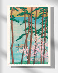 Kawase Hasui's Japanese Art Poster exhibits a boat sailing on water, surrounded by cherry trees in full bloom.