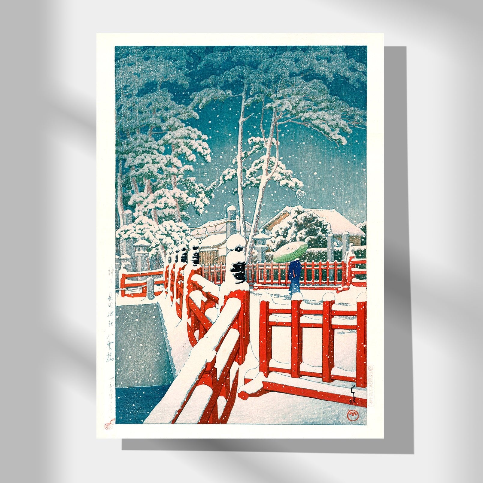 Japanese Art Poster by Kawase Hasui featuring a woman with an umbrella crossing a red bridge in the snow
