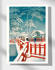 Japanese Art Poster by Kawase Hasui featuring a woman with an umbrella crossing a red bridge in the snow